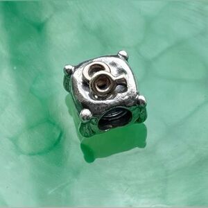 Pandora Sterling Silver and gold Wedding Day charm.